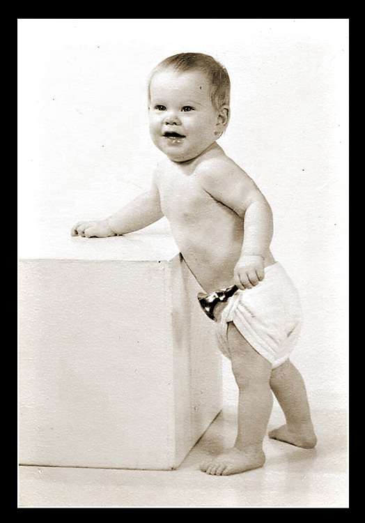 My youngest brother is the New Year's baby in this studio portrait made in 1964.